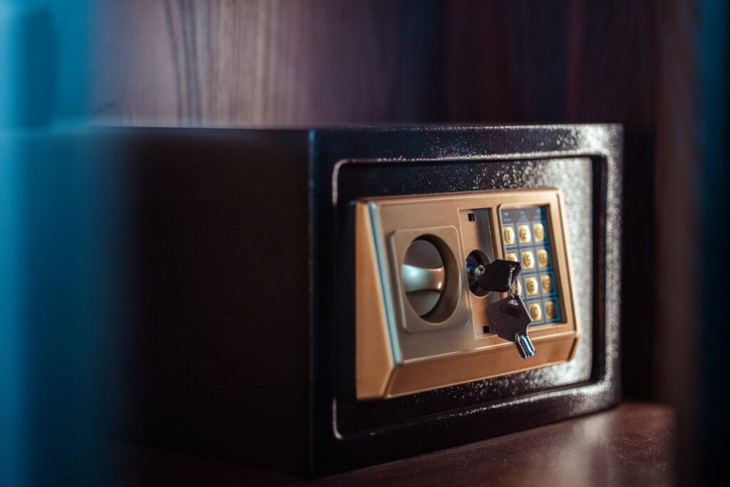 Small electronic safe with a keypad and override key in the lock