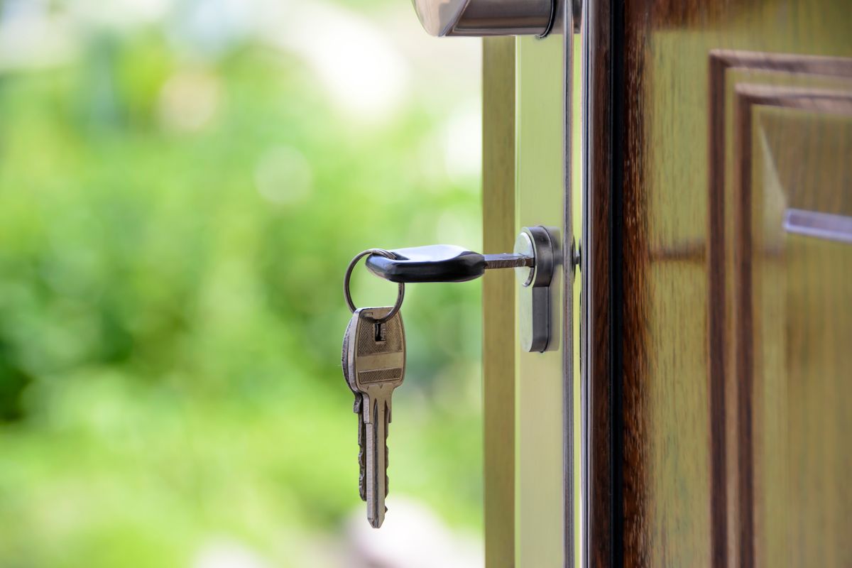 Keys left hanging in an apartment door lock — a common way New Yorkers get locked out