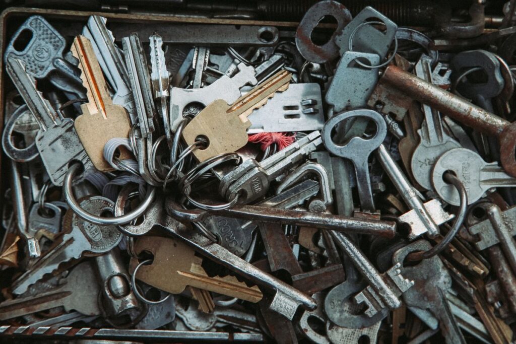 Drawer full of assorted unlabeled keys from different locks