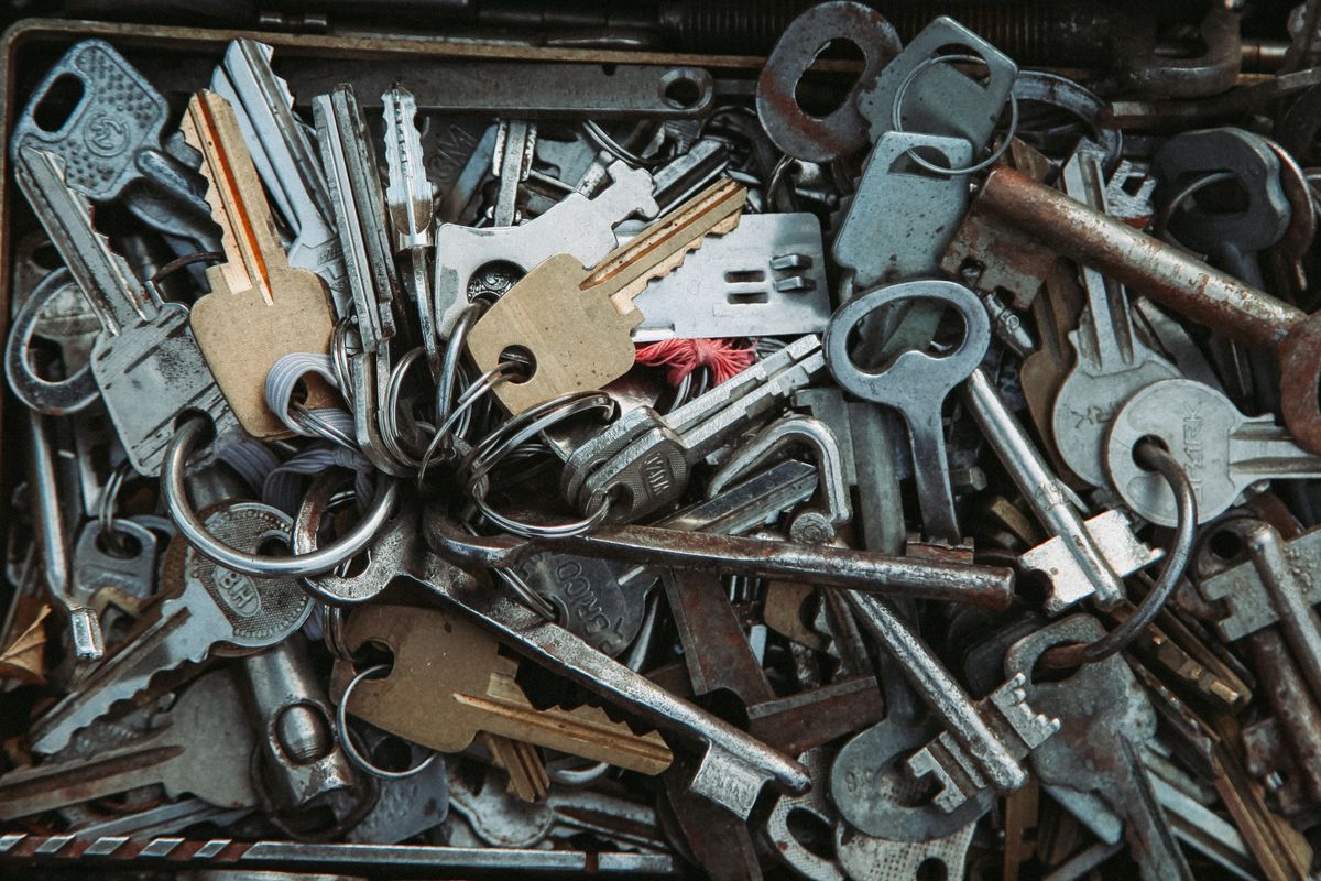 Drawer full of assorted unlabeled keys from different locks