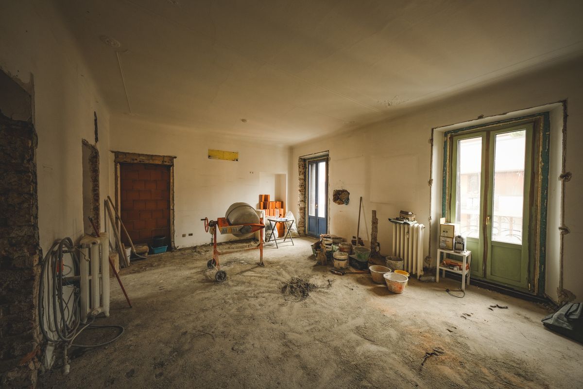Commercial space mid-renovation with tools and bare walls